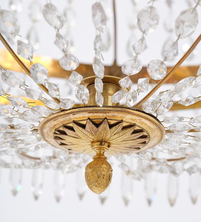 A late Gustavian gilt brass and cut glass seven-light chandelier, Stockholm, late 18th century.