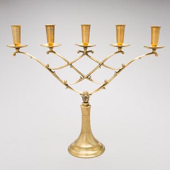 A BRASS CANDELABRUM, Taito, 1920/30s.