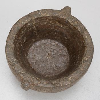 A llimestone mortar and pestle, 18th/19th Century.
