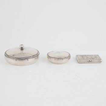Two Finnish silver boxes and a business card holder.