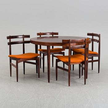 A dining table with four chairs by Poul Hundevad, latter part of 20th century.