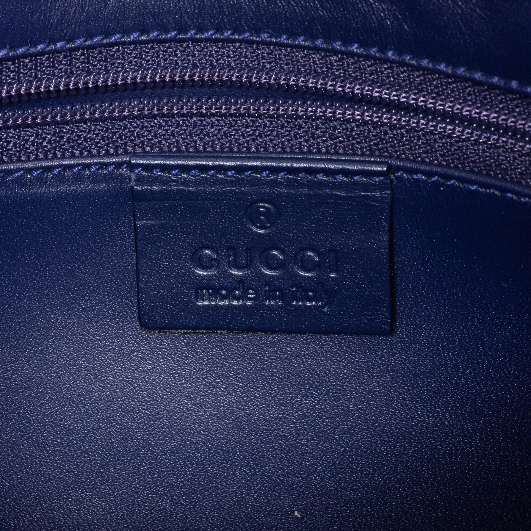Gucci, a blue leather and fabric bag.