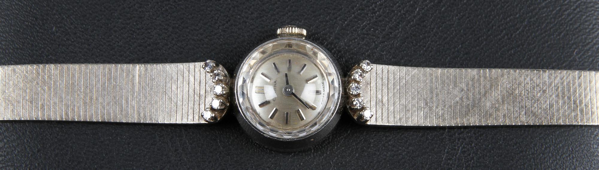 DAMARMBANDSUR, 18 K vitguld samt 10 diamanter, art deco, Certina, Schweiz.