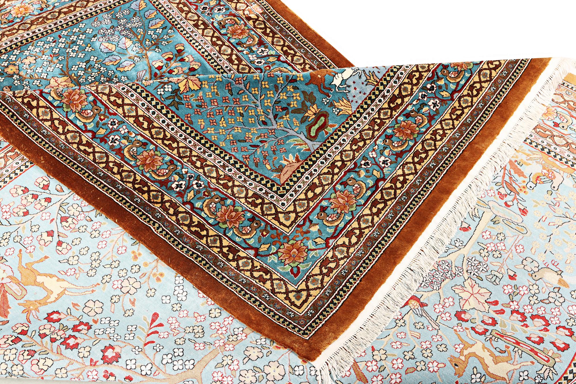 An all silk oriental carpet, a. 280 x 185 cm.