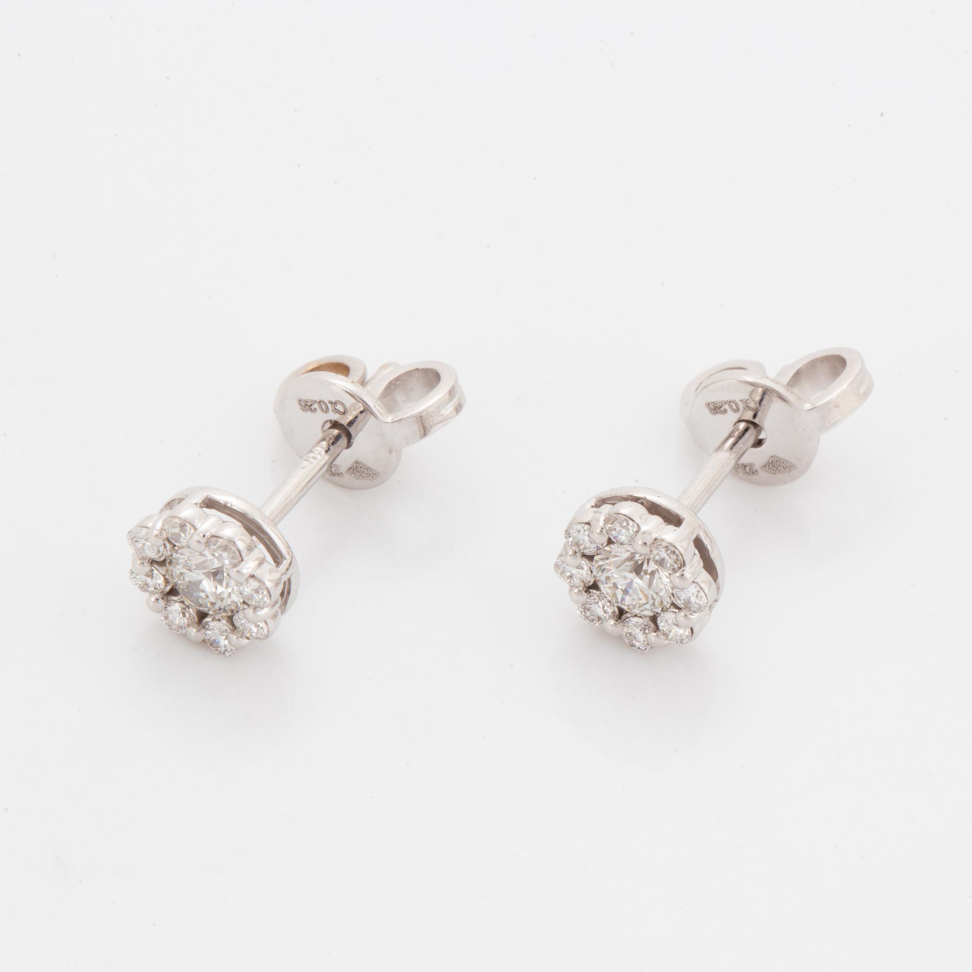 Brilliant-cut diamond earrings.