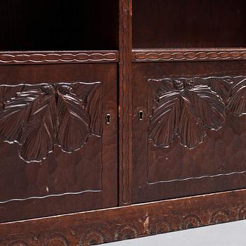 Otto Wretling, attributed to, an Art Nouveau carved pine book shelf, Umeå, Sweden, early 20th century.