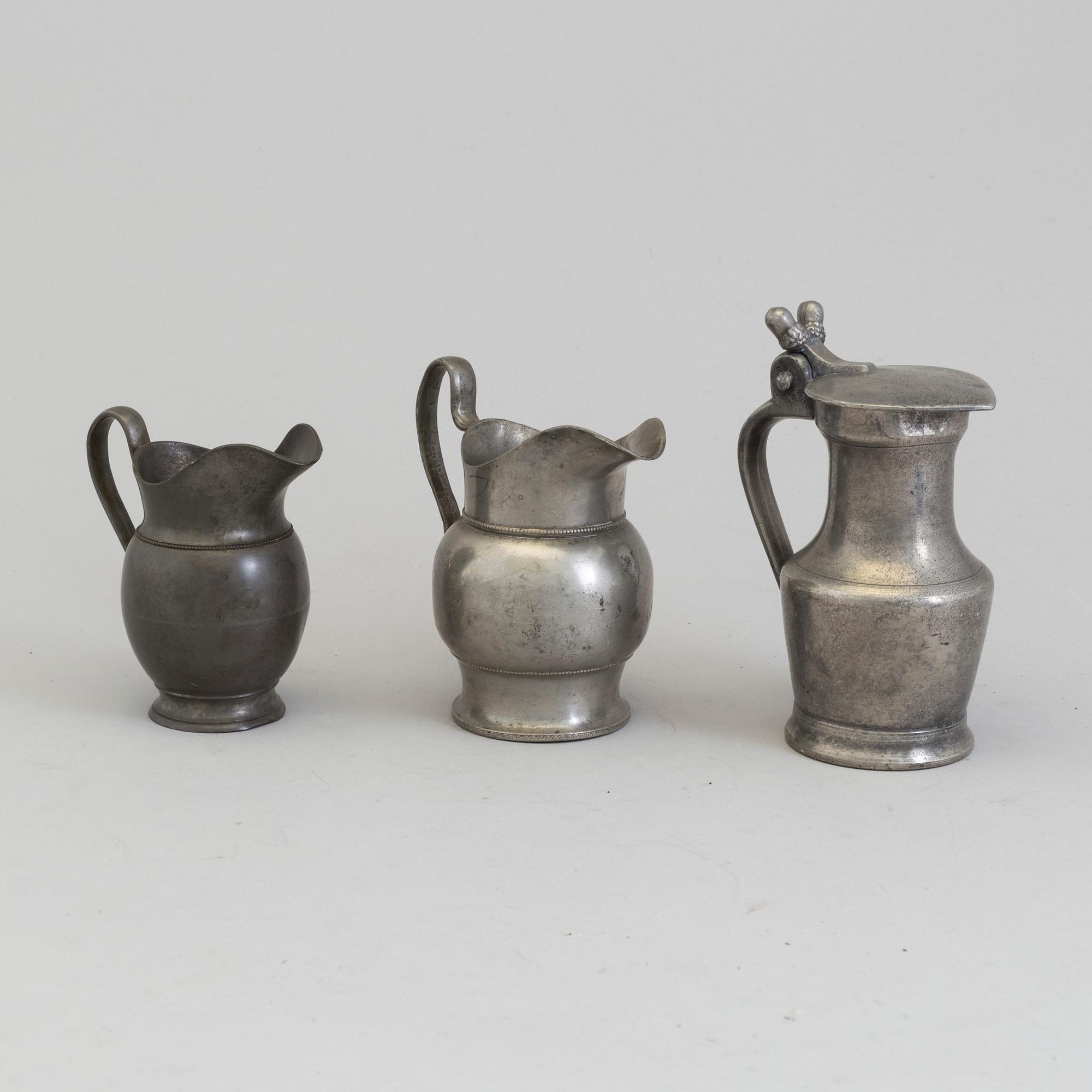THREE PEWTER JUGS, 18th/19th century.