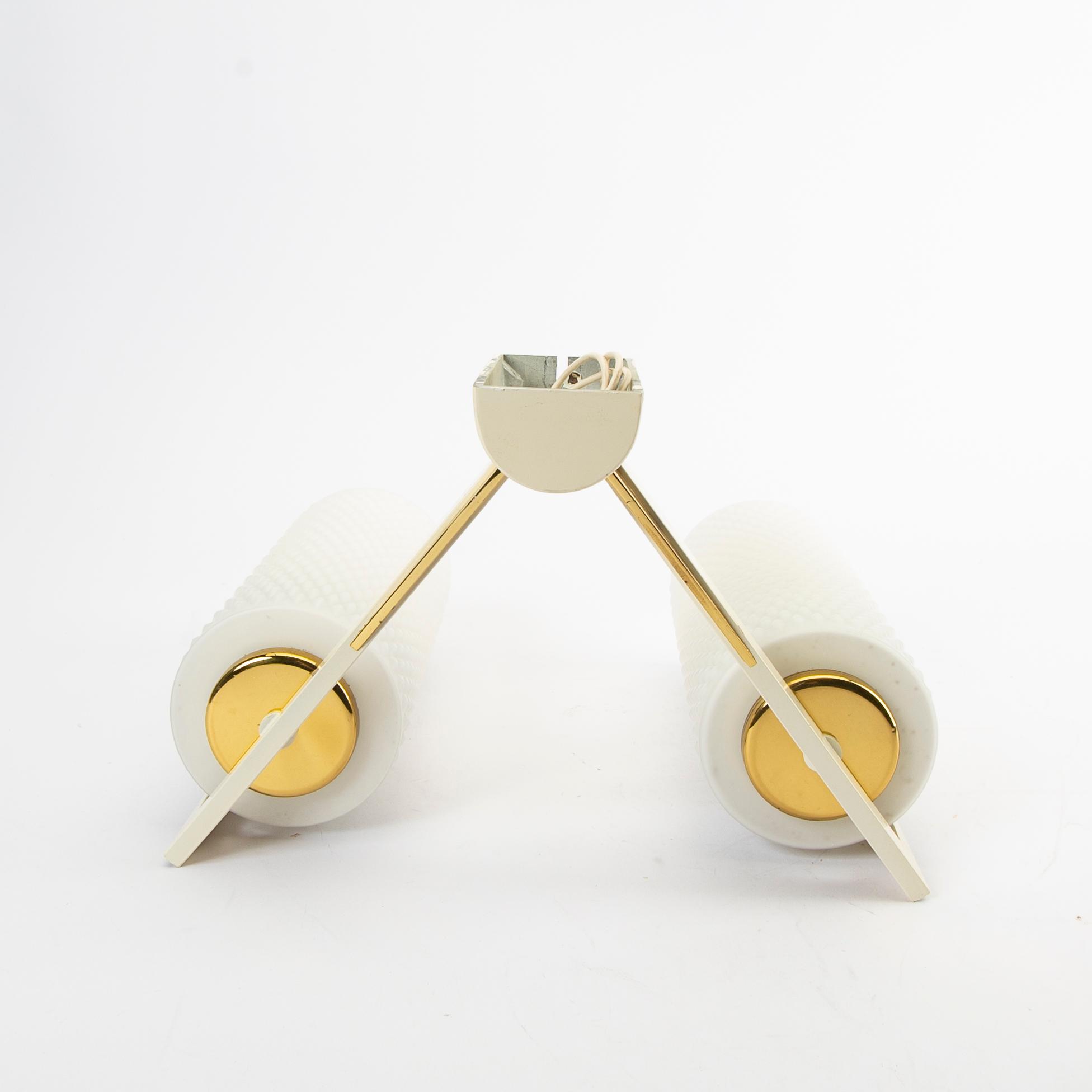 A set of three 1950760 wall scones.