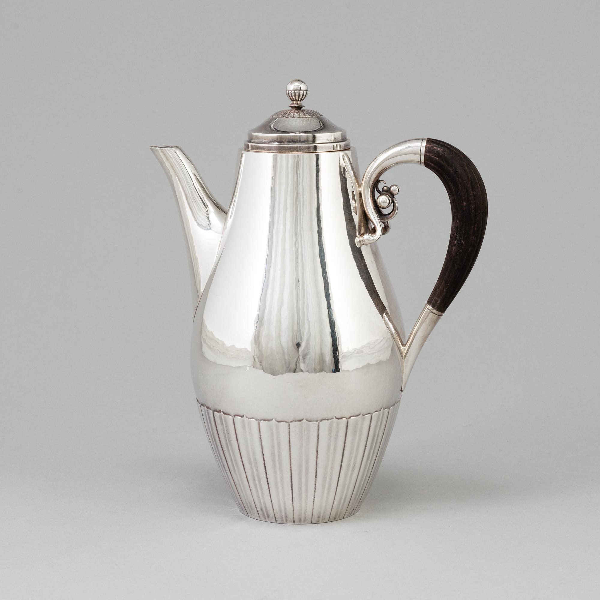 A silver coffee pot, designed by Johan Rodhe for Georg Jensen, Denmark, after 1945. Weight ca 647 grams.