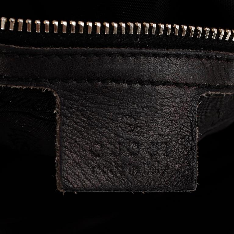 GUCCI, a black leather shoulder bag, "Indy bag".