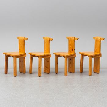 A set of four pinewood chairs, late 20th Century.