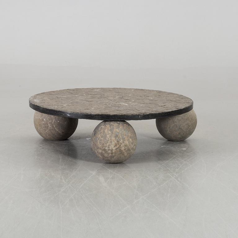 A 20th century stone sofa table.