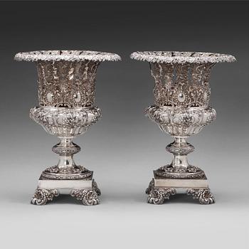 213. A pair of Swedish mid 19th century silver urns, mark of Fredrik and Wilhelm Zethelius, Stockholm 1840.