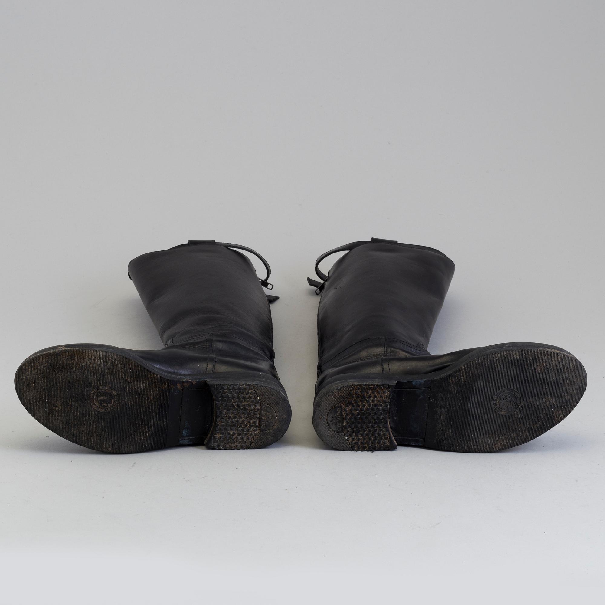 a pair of Ann Demeulemeester, "Vitello Lucido Nero Riding Boots". Size 38.