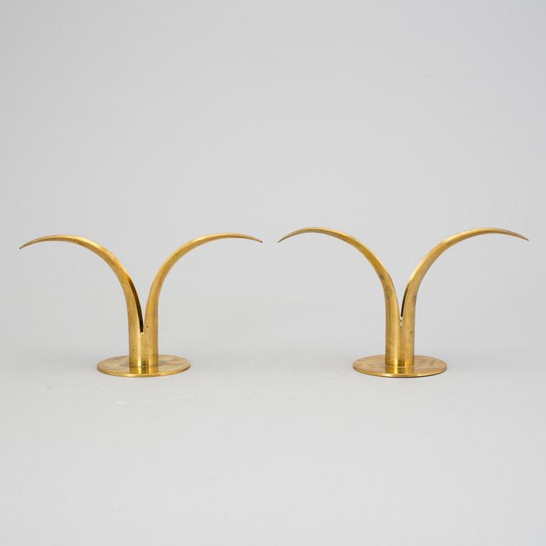Two brass candlesticks by Ivar Ålenius-Björk, "Liljan", Ystad Metall.