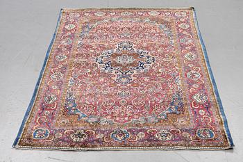 A rug, semi-antique silk Kashan, ca 194 x 127 cm.