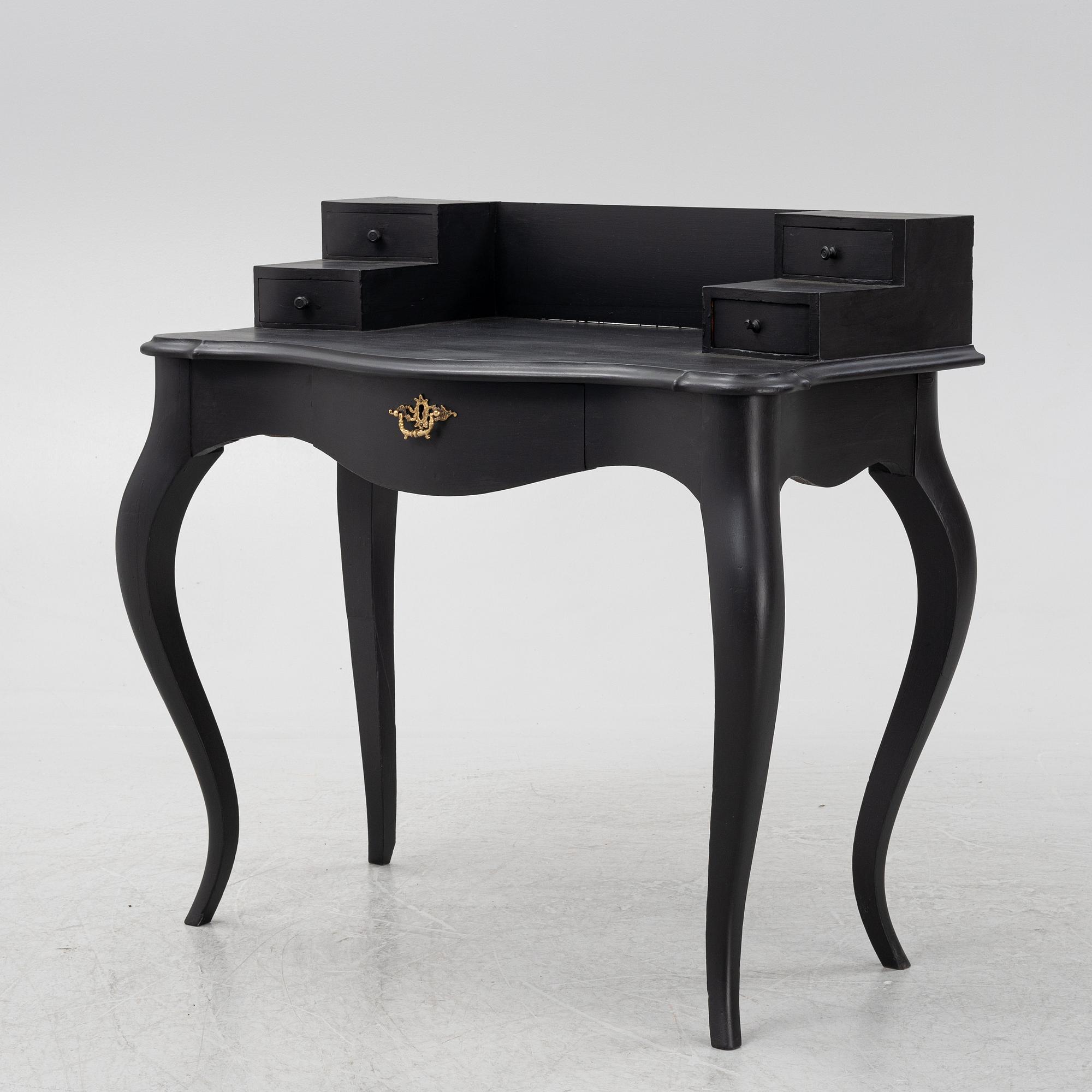 A painted rococo style writing desk, from around the year 1900.