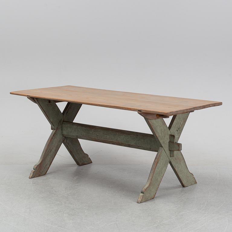 A 19th Century painted pine table.