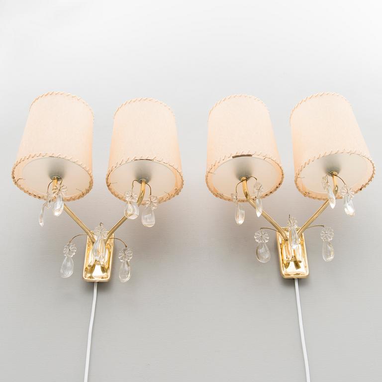 A pair of early 1950s '9413' wall lights for Taito, Finland.