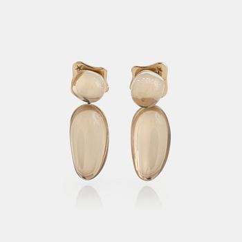 967. A pair of 18K gold H Stern earrings set with cabochon-cut rock crystal.