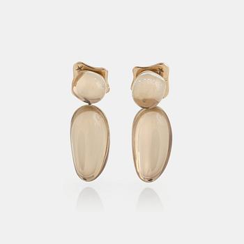 967. A pair of 18K gold H Stern earrings set with cabochon-cut rock crystal.