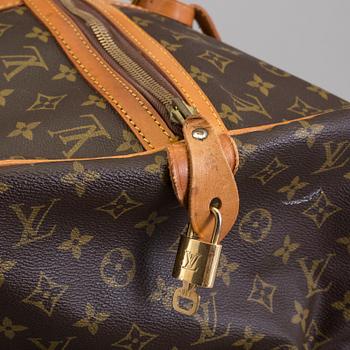 a LOUIS VUITTON "Sac Souple 55" weekend bag.