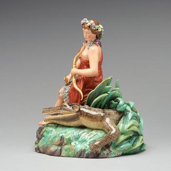 A Royal Copenhagen allegorical porcelain figure representing 'America', Denmark, 1920's.