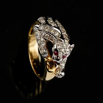 RING, 18k guld och vitguld med 2 rubiner samt 60 små briljantslipade diamanter, 1900/2000-tal. Vikt 7 g.