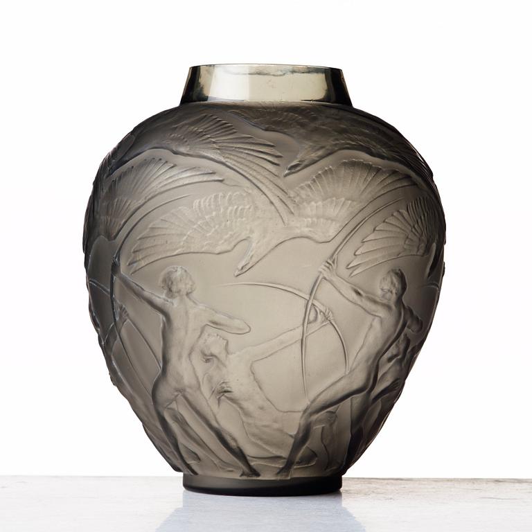 René Lalique, an "Archers" moulded smoke-coloured glass vase, model nr 893, France, post 1921.