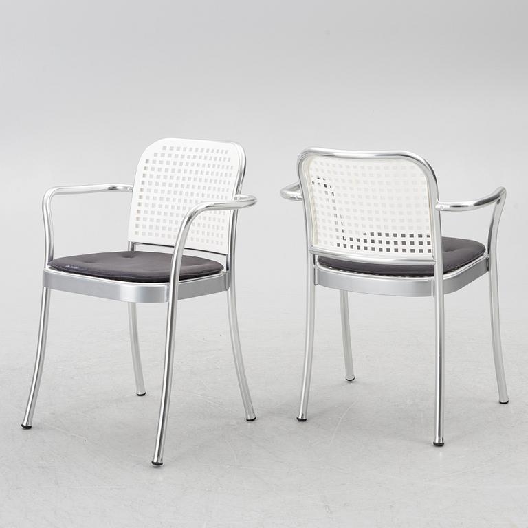 Vico Magistretti, a "Shine" dining table with twelve chairs, De Padova, Italy, around the year 2000.