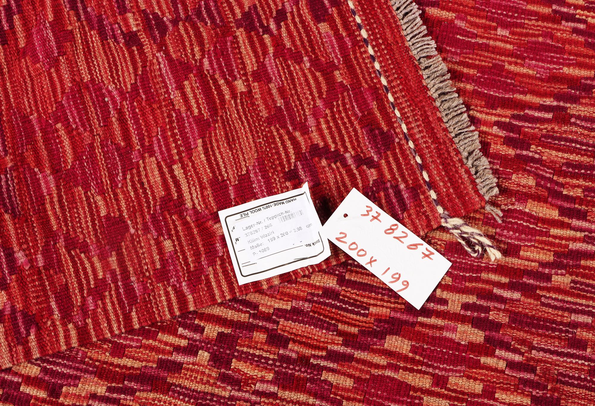 An Afghan Kelim carpet, c. 200 x 199 cm.