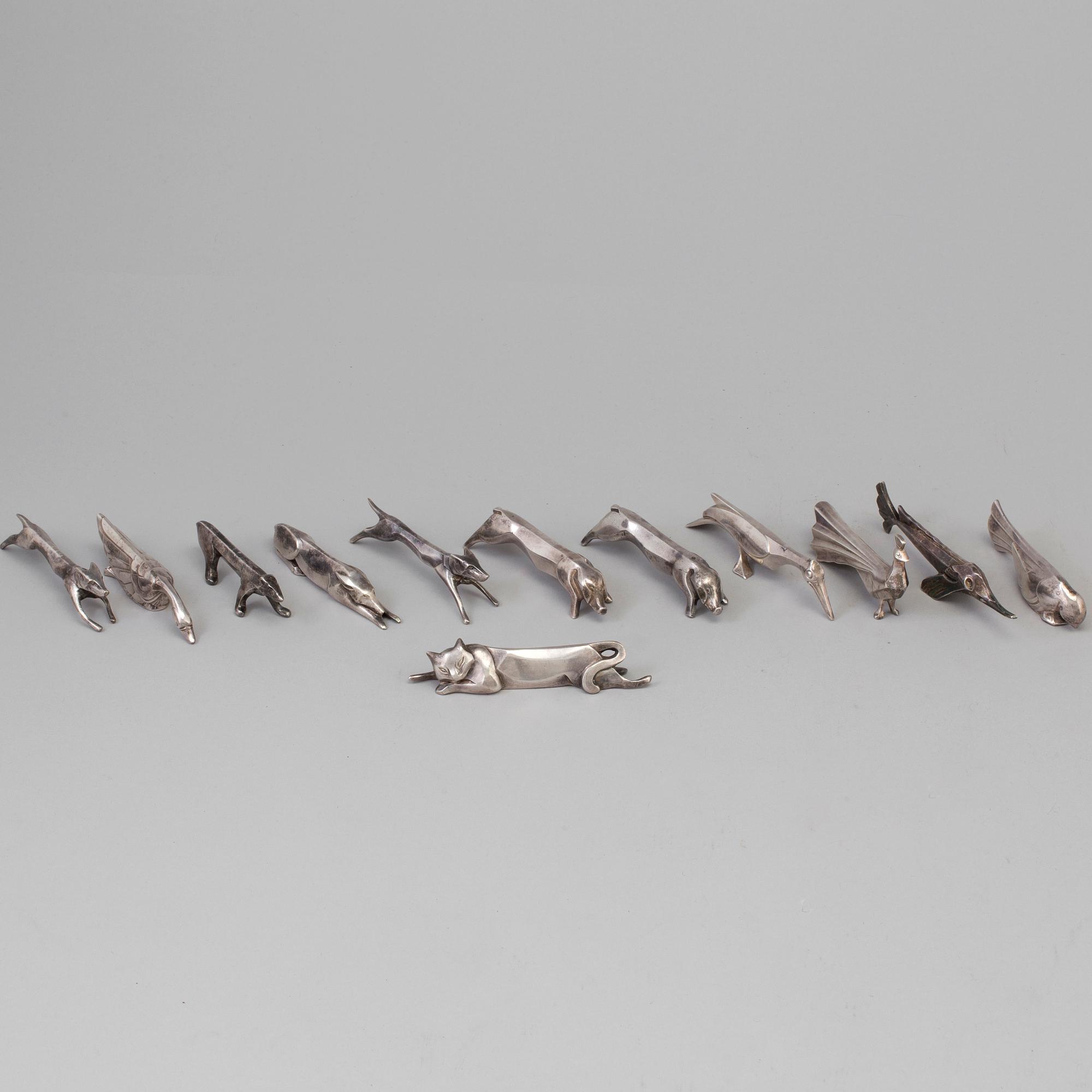 12 silver plated animal-shaped knife rests designed by Marcel Edouard Sandoz for Gallia Christofle, France.