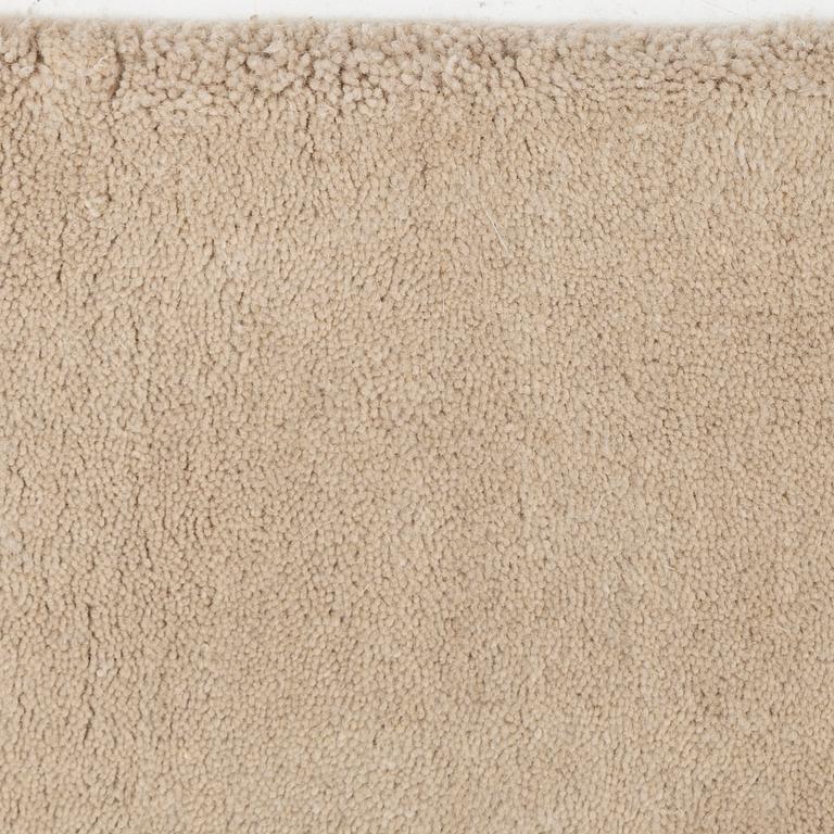 A hand tufted carpet, "Structured  Oatmeal", by lLayered ca 355 x 255 cm.
