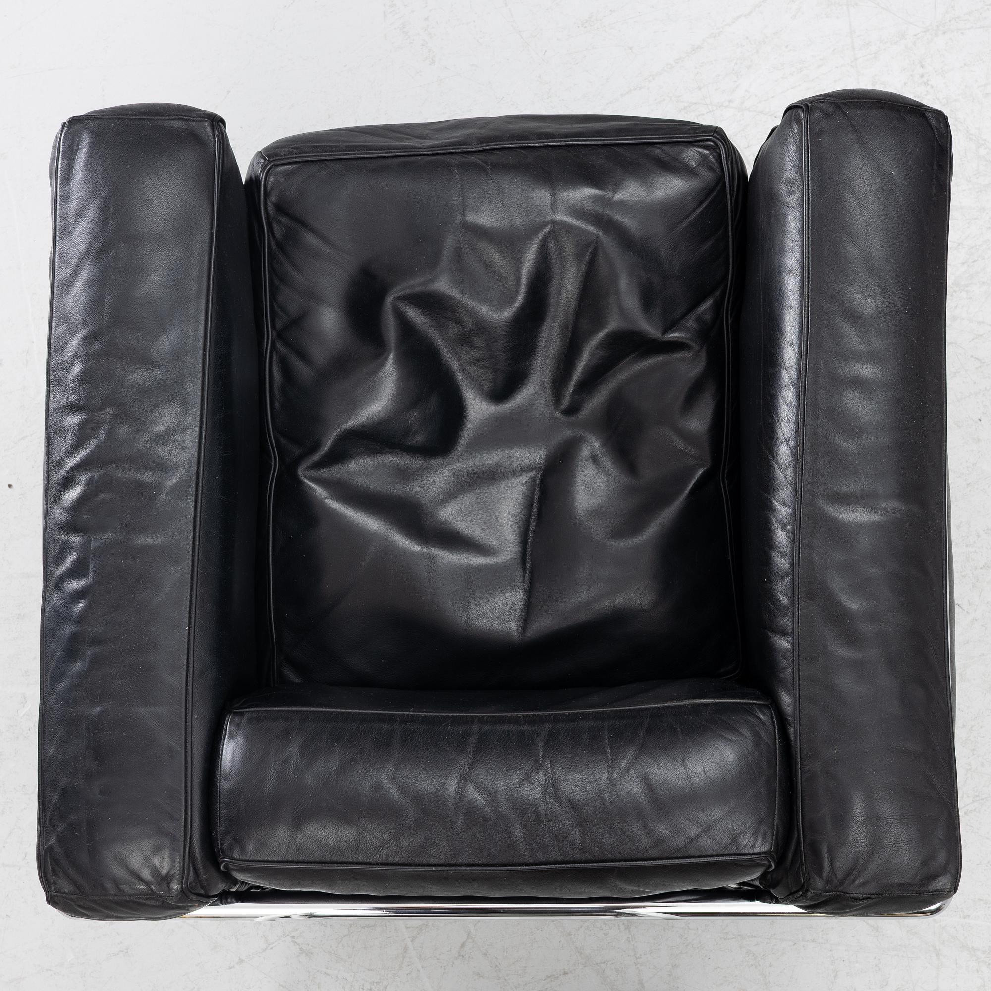 a pair of "LC2" armchairs, Cassina, second half of the 20th century.