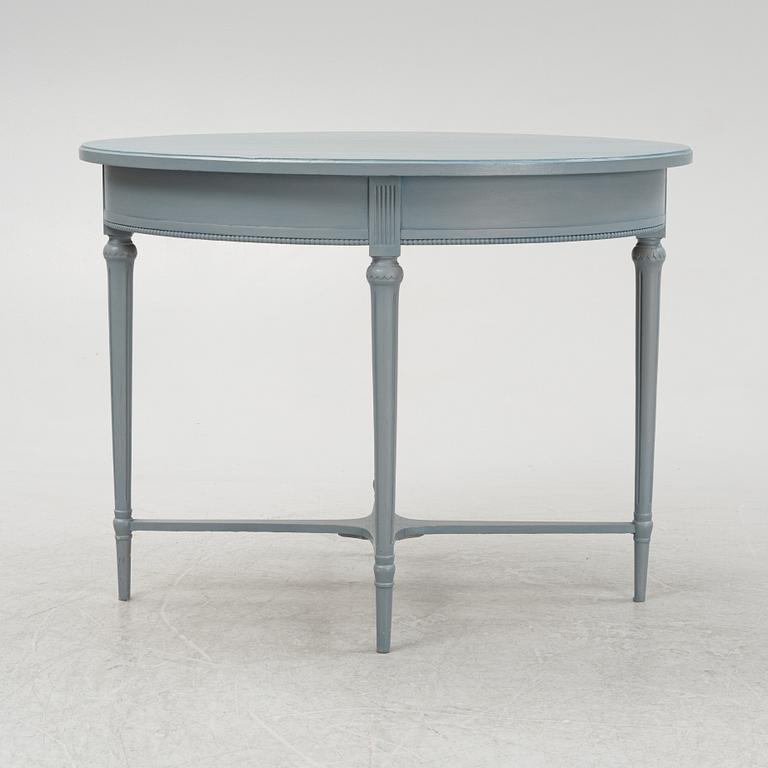 A painted sofa, table, a pair of chairs, a pair of armchairs, a pair of stools, Gustavian style, 20th Century.