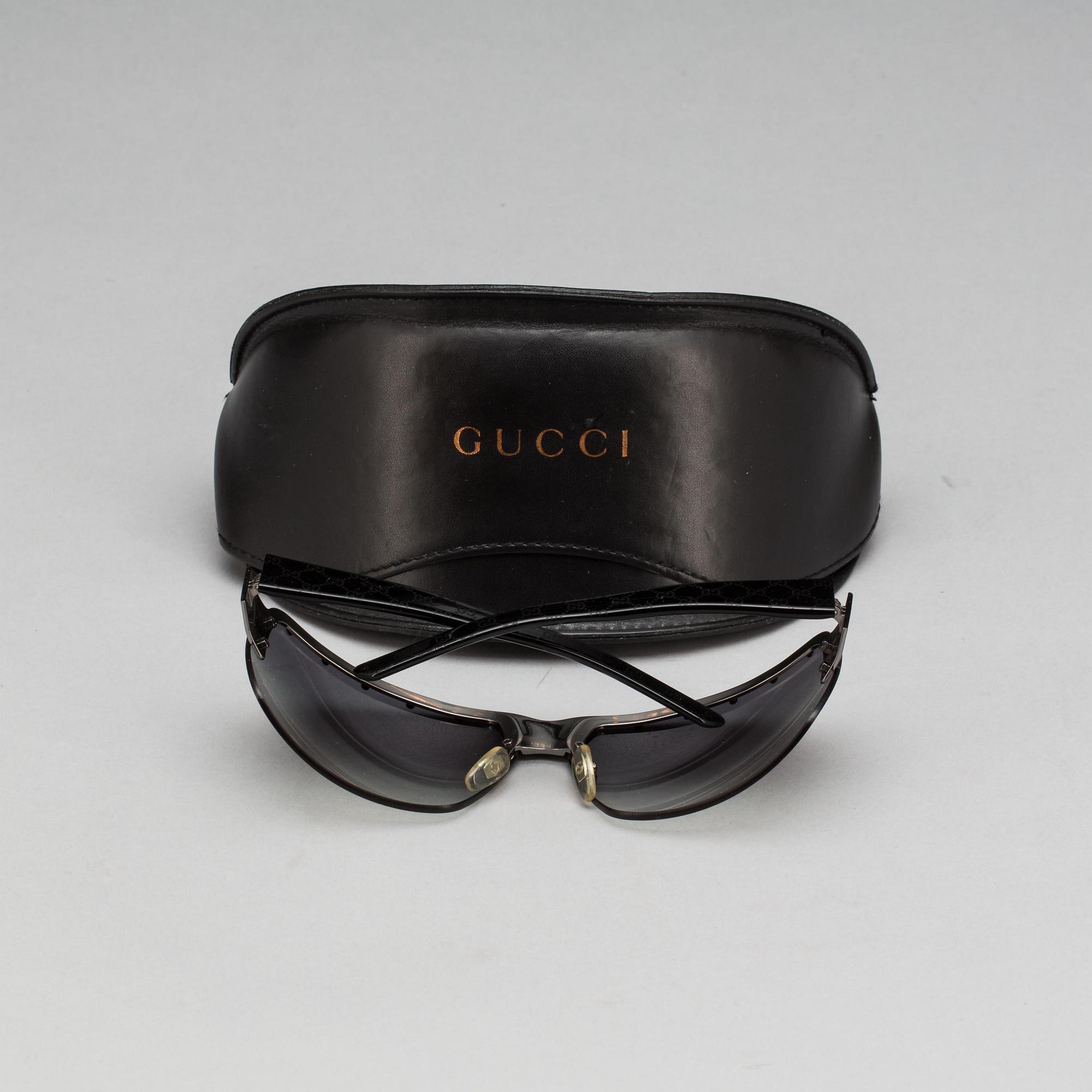 SOLGLASÖGON, Gucci.