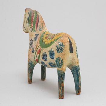 A Dala horse, painted pine, circa 1900.