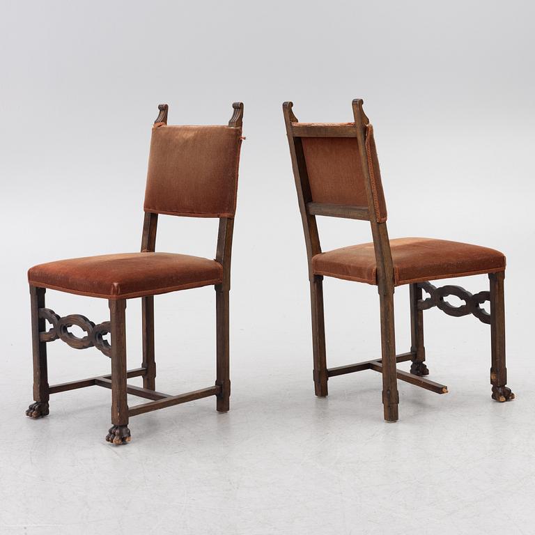 A Baroque-style dining table with six chairs, around 1900.