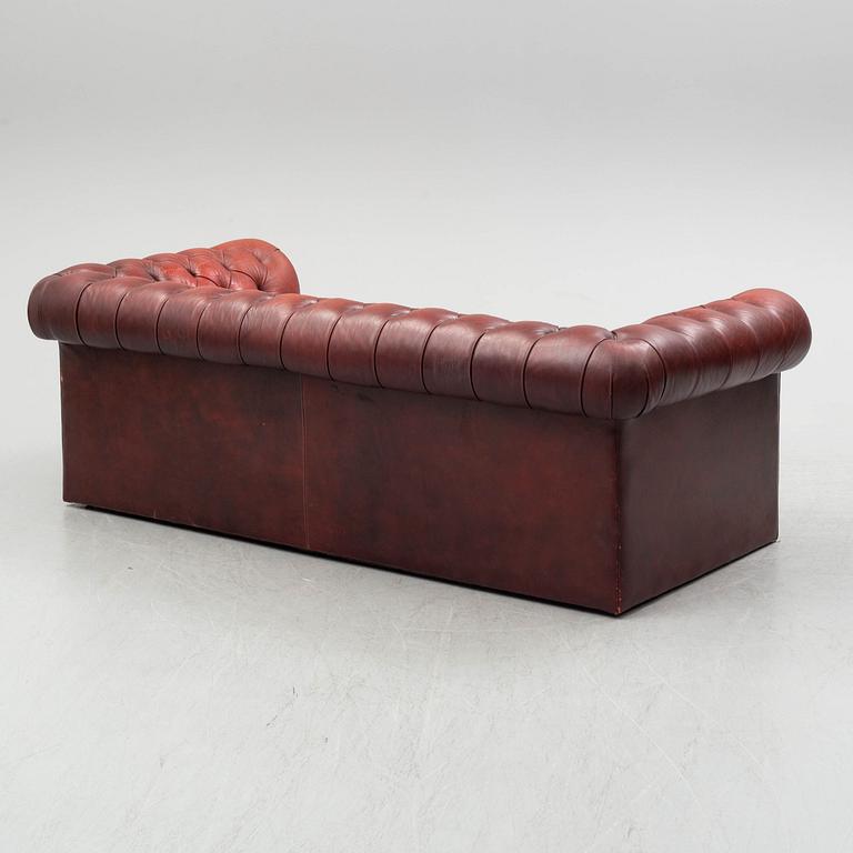 A sofa and a pair of armchairs, England, second half of the 20th century.
