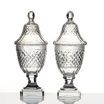A set of two cut glass jars with covers, Anglo/Irish, 19th Century.