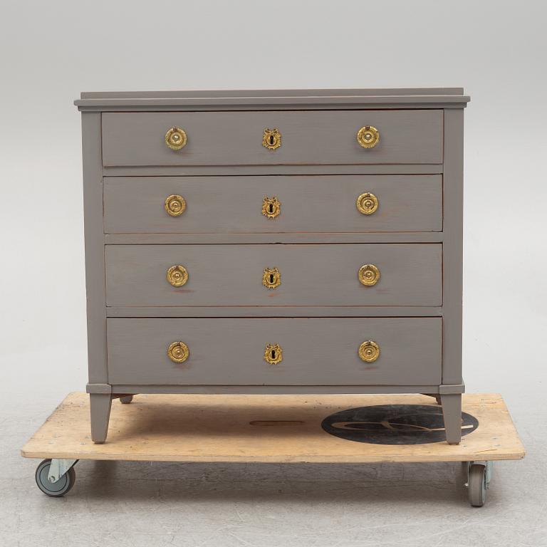 A Gustavian style chest of drawers, early 20th century.