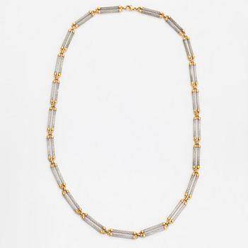 A 'Force 10' necklace, 18K gold and steel. Fred, Paris 1980's.