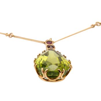 Ateljé Stigbert, necklace in 18K gold with a pear-shaped peridot and faceted rubies, Heribert Engelbert Stockholm 1948.