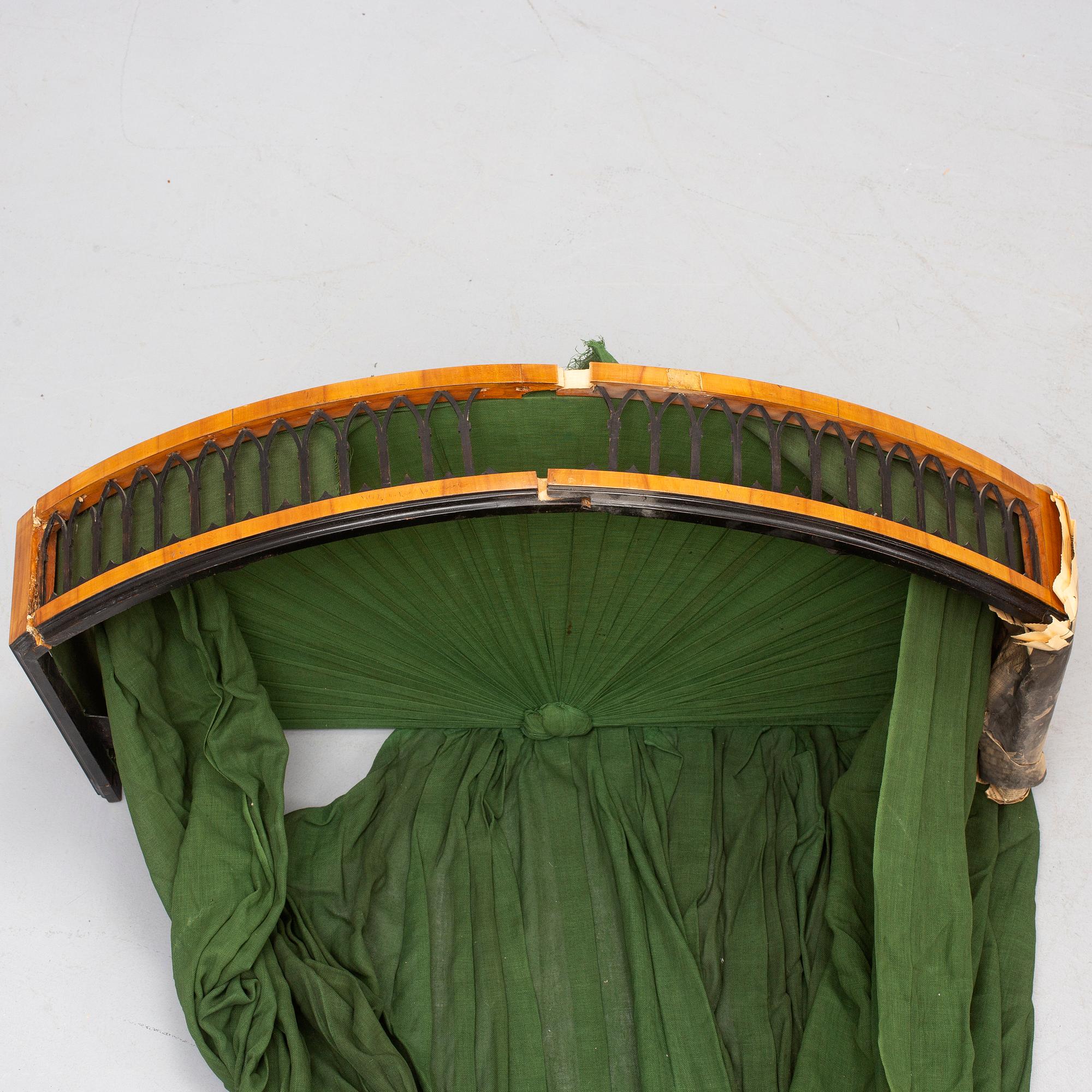 A mid 19th century Biedermeier bedframe.