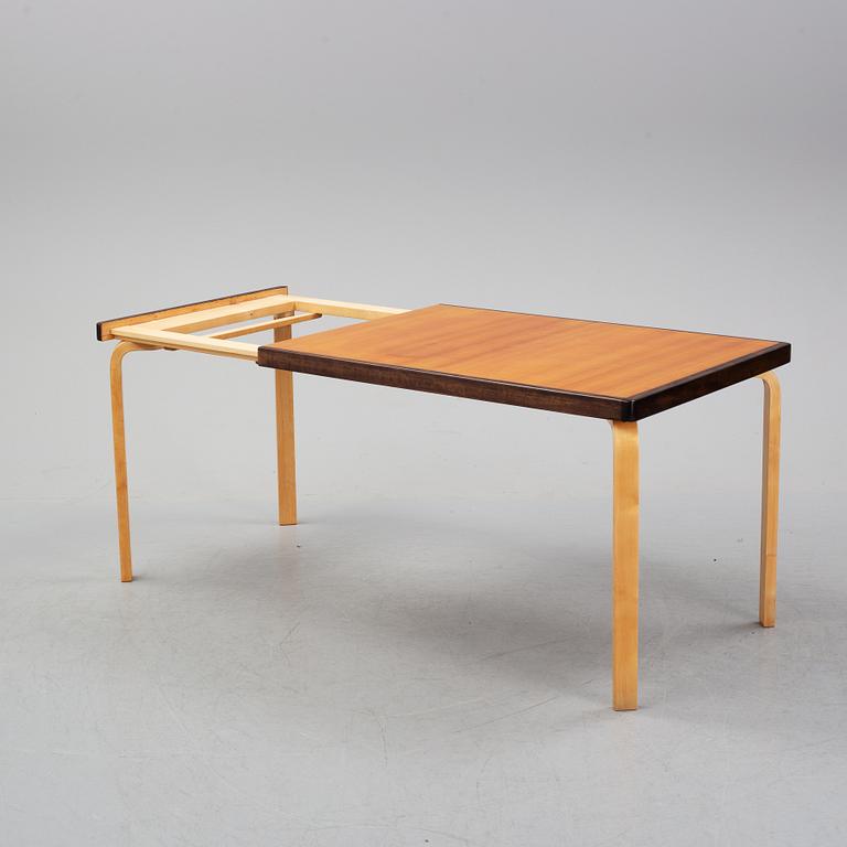 Alvar Aalto, a teak dining table, Artek, Finland, mid 20th Century.
