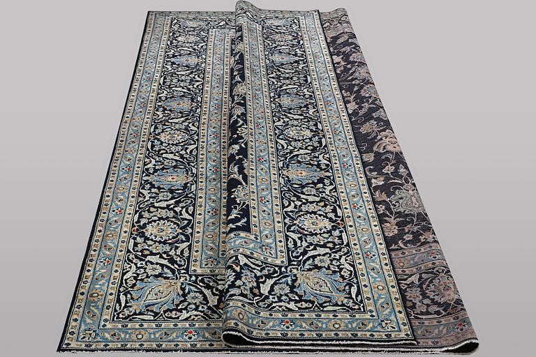 A carpet, Kashan, ca 329 x 275 cm.