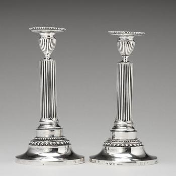 A pair of Swedish Gustavian silver candlesticks, mark of Mikael Nyberg, Stockholm 1788.