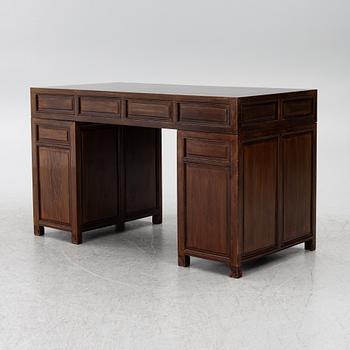 A Chinese hardwood desk, 20th century.