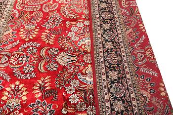 An oriental carpet, part silk, c. 360 x 274 cm.