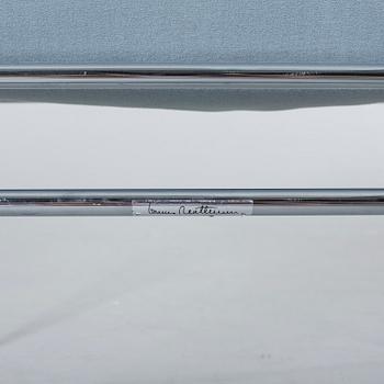 A COUPLE OF BRUNO MATHSSON ARMCHAIRS.